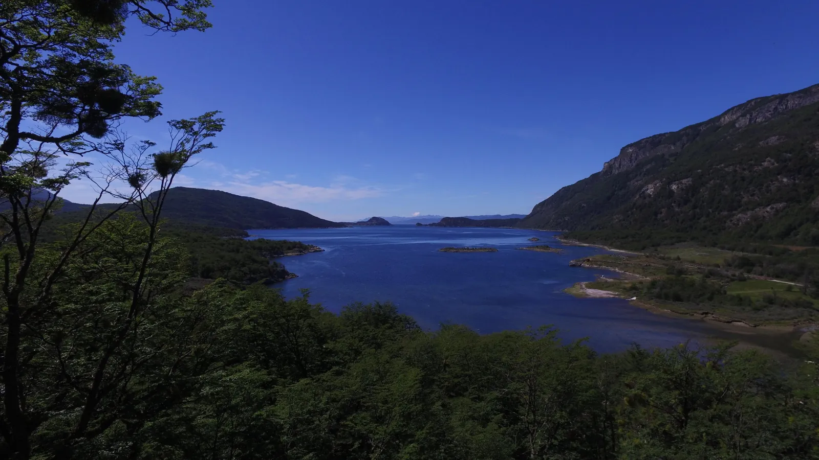 Lake and forested hills seen from above in Tierra del Fuego National Park